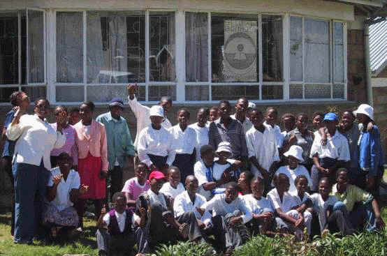 Learners in front of the present rented facilities at Emmanuel Hostel